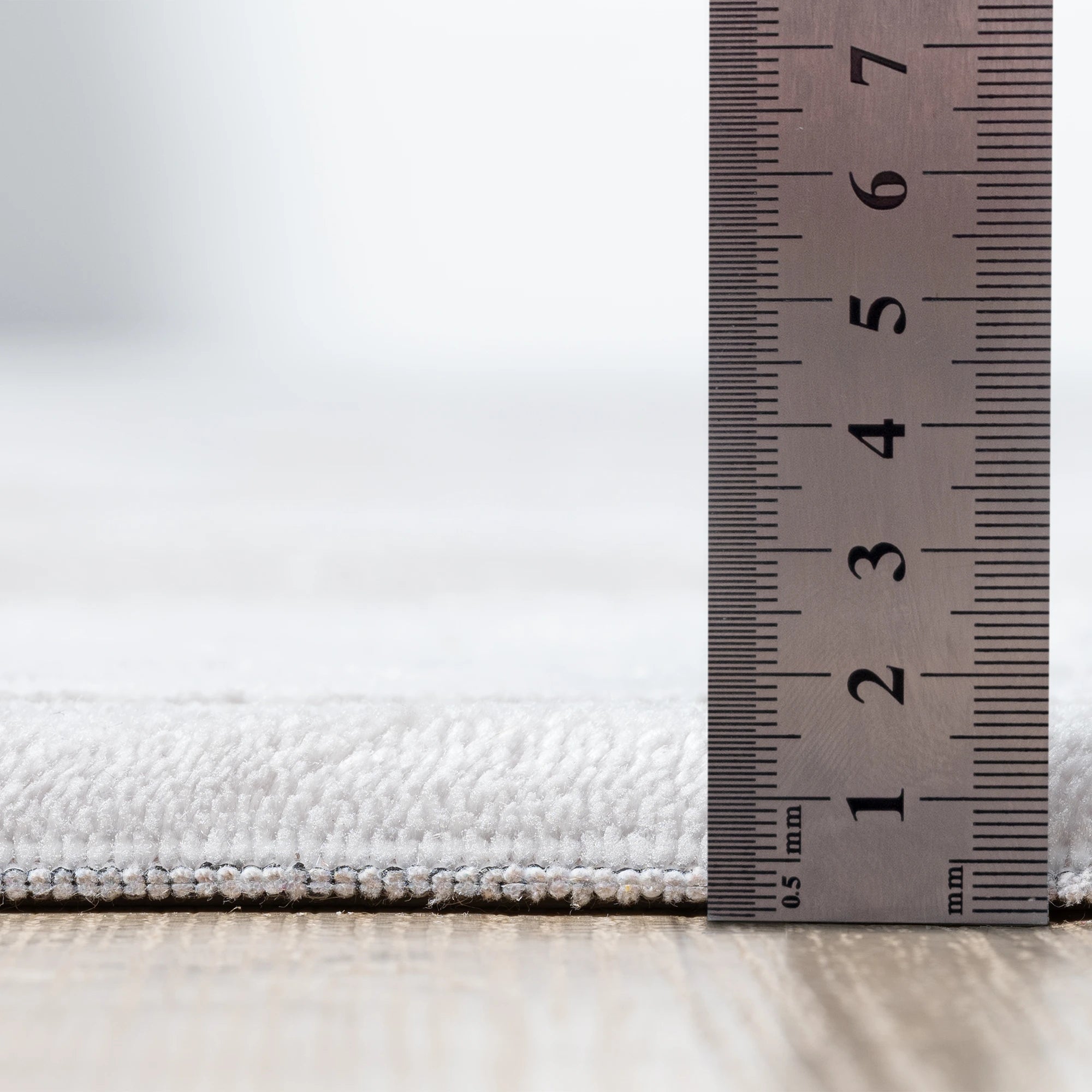 Бежевий квітковий килим-медальйон