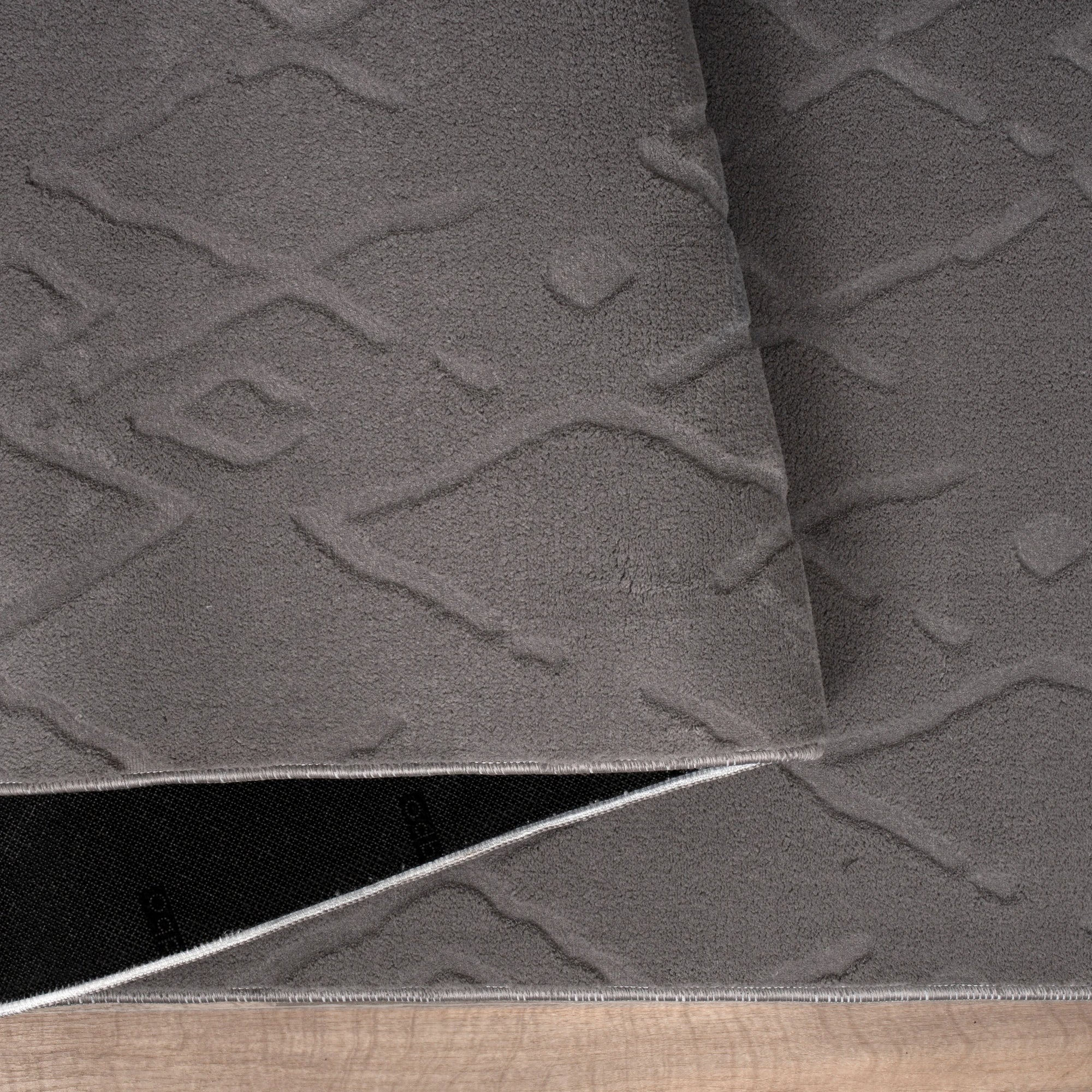 Сталево сірий ромбовий килим