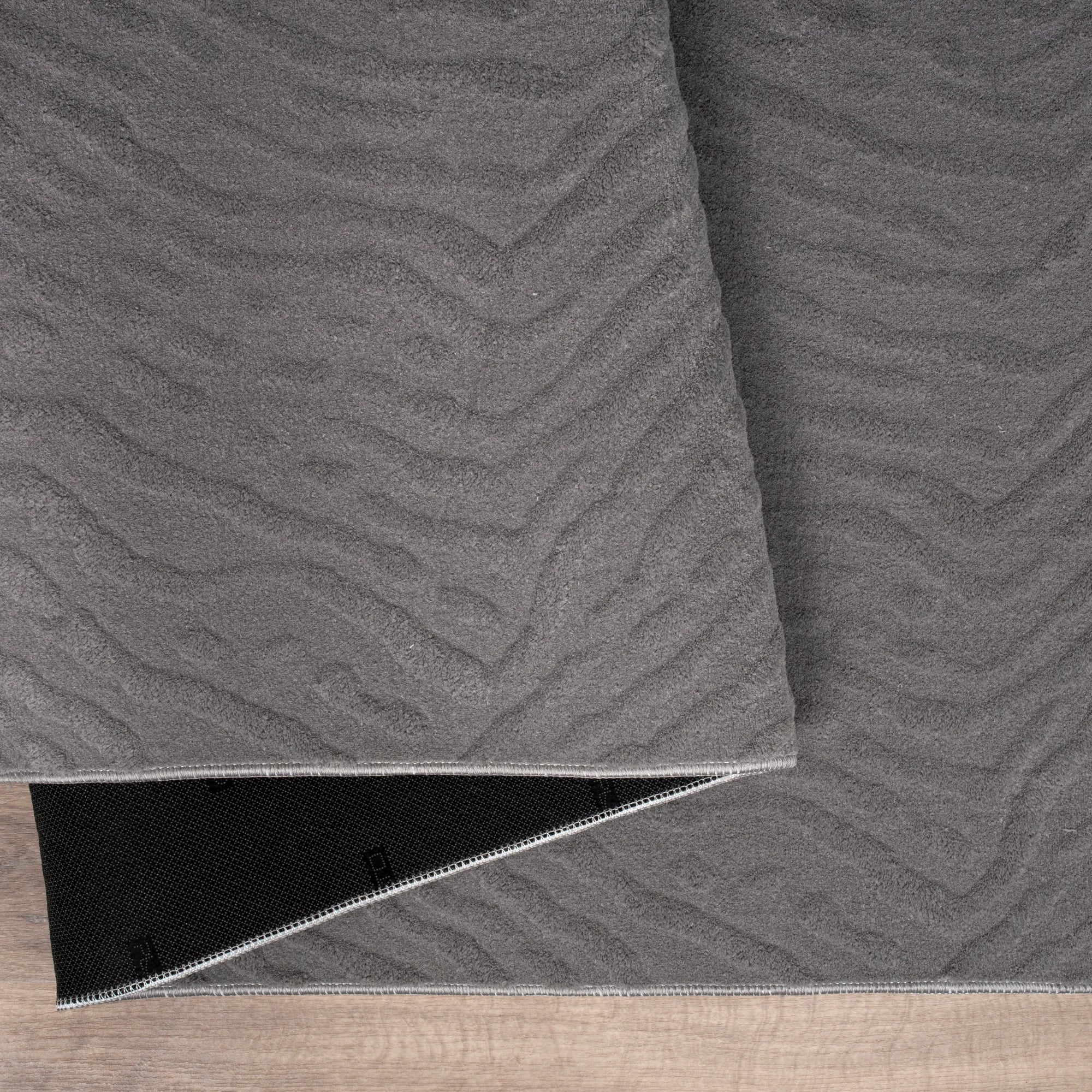 Сірий хвилястий килим