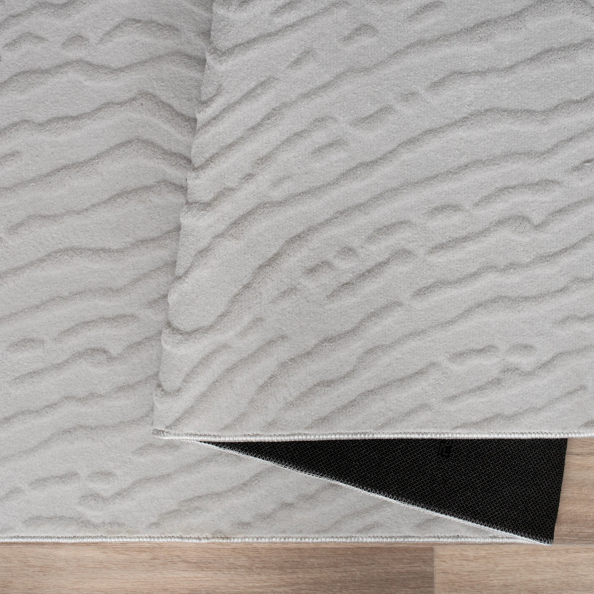 Світло сірий хвилястий килим