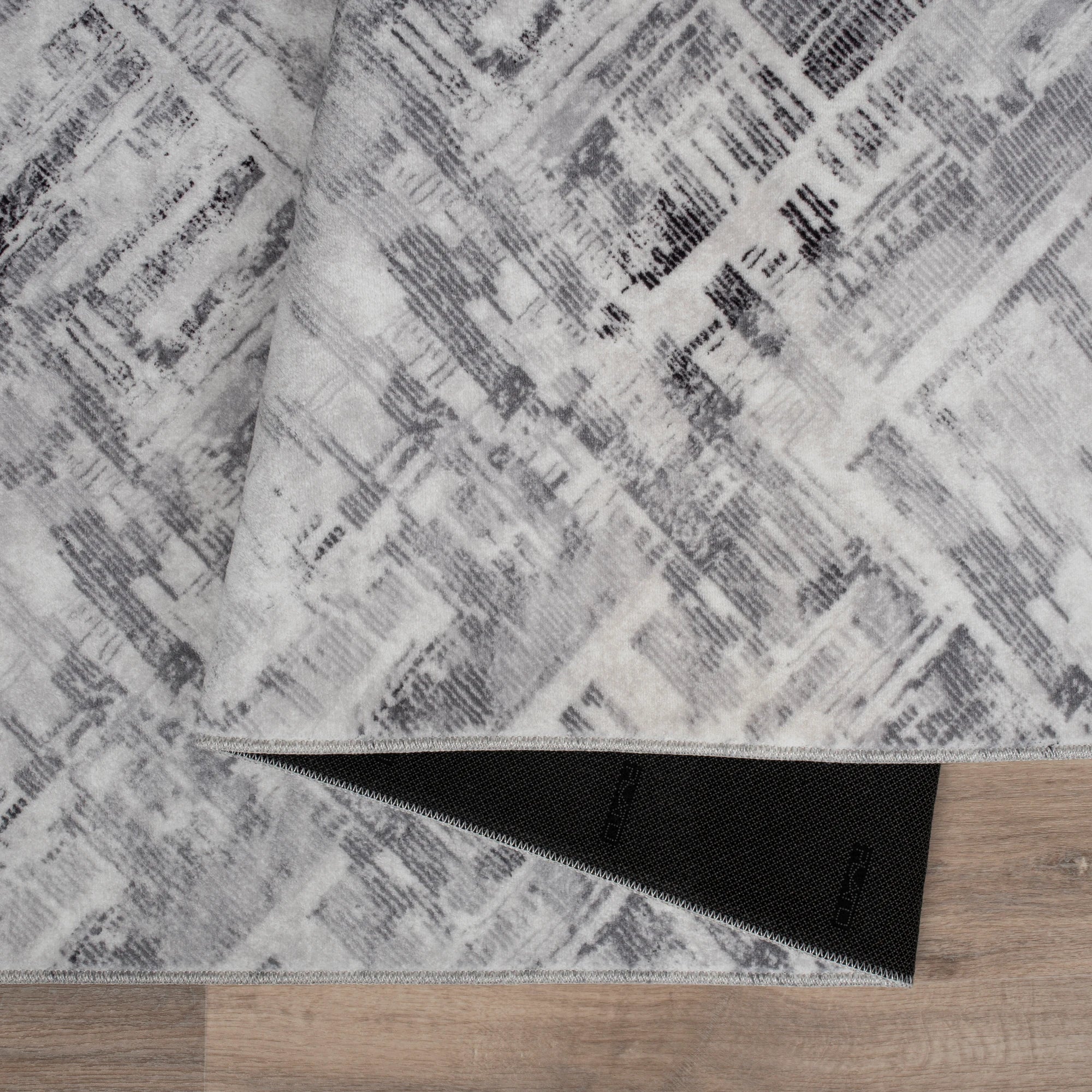 Індустріальний сірий килим