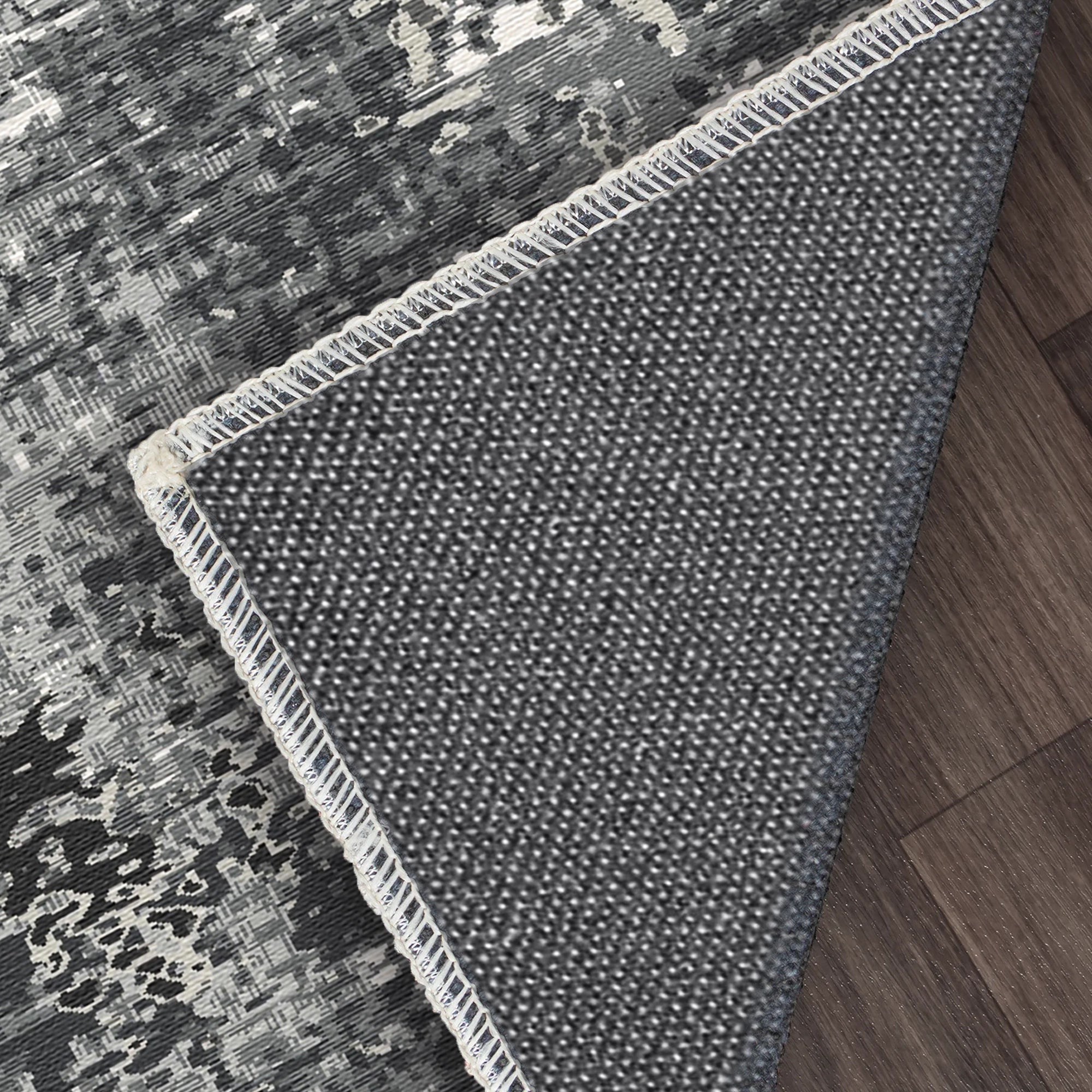 Статичний промисловий абстрактний килим Obsidian