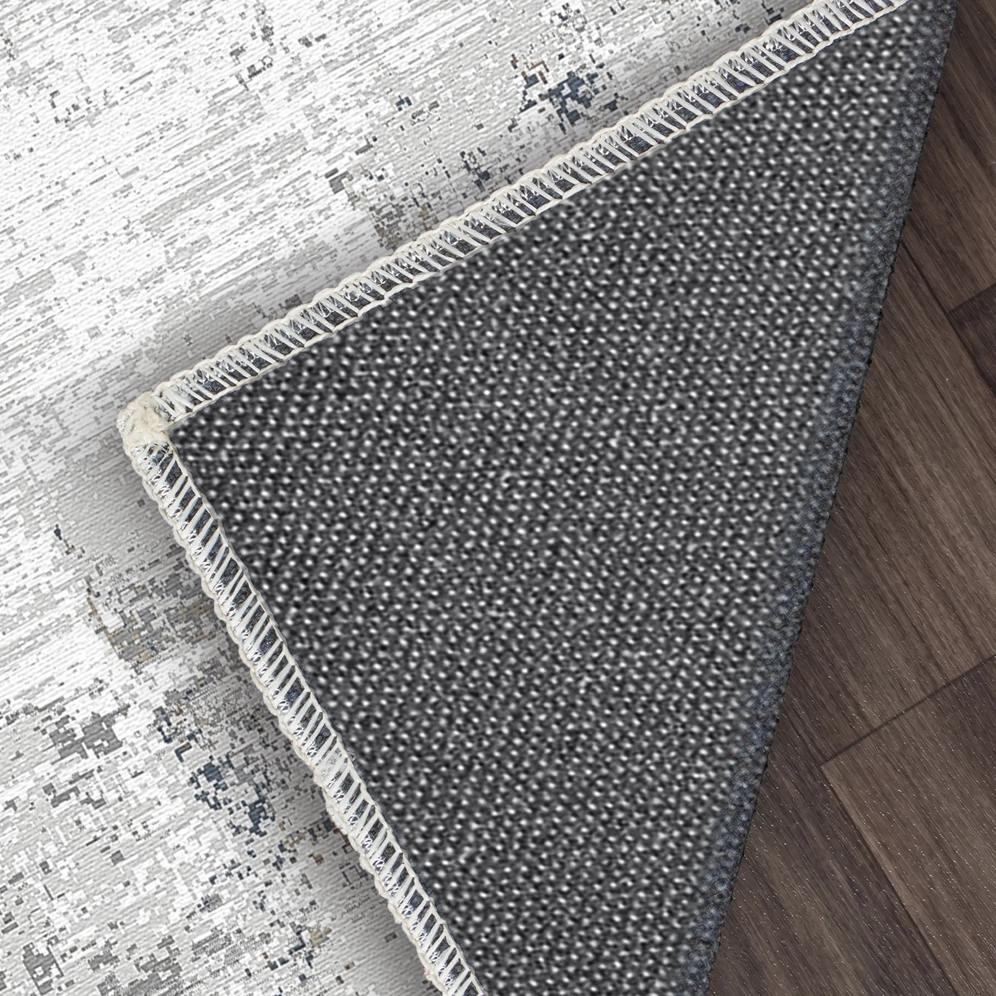 Срібний шиферний килим зі зістареним абстрактним малюнком