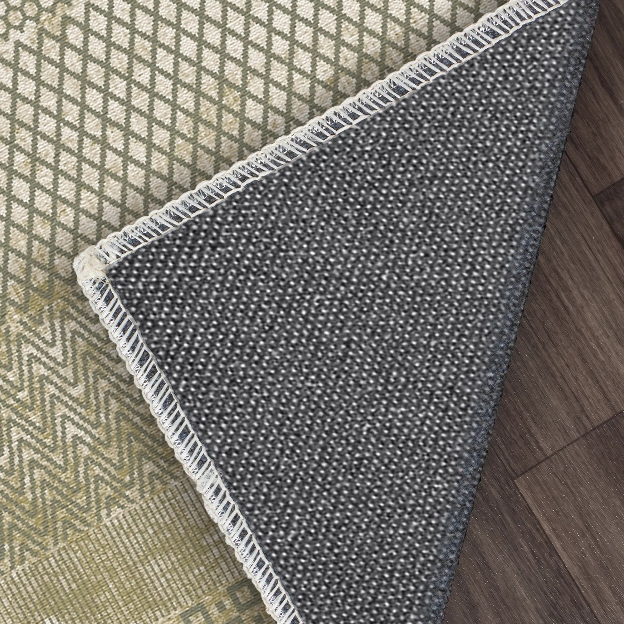 Оливково-зелений мозаїчний килим з геометричними смугами